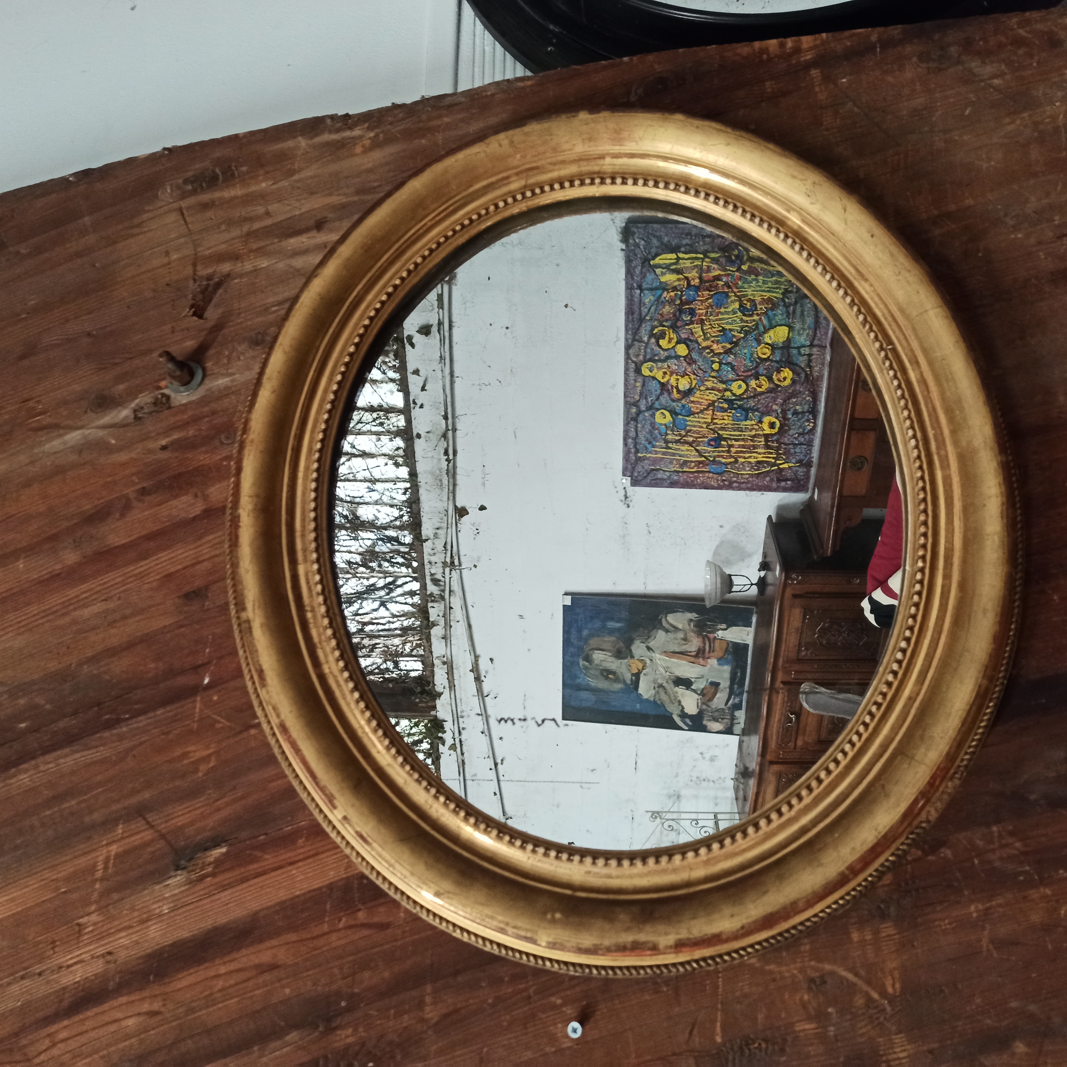 MIROIR OVALE DORE A MOTIF PERLE