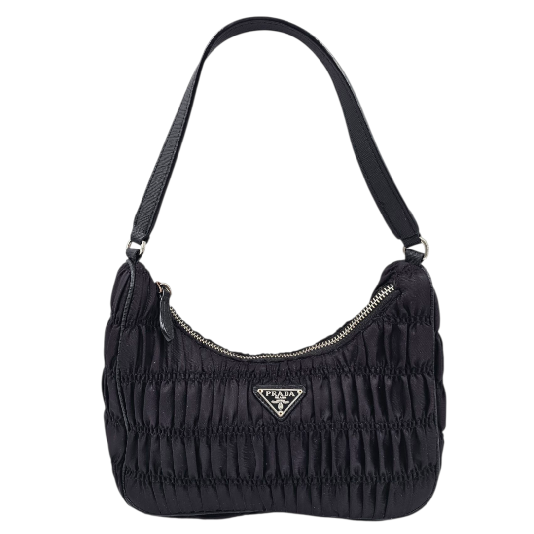 PRADA SAC EN NYLON TISSU GAUFFRE TESSUTO ET CUIR SAFFIANO NOIR
