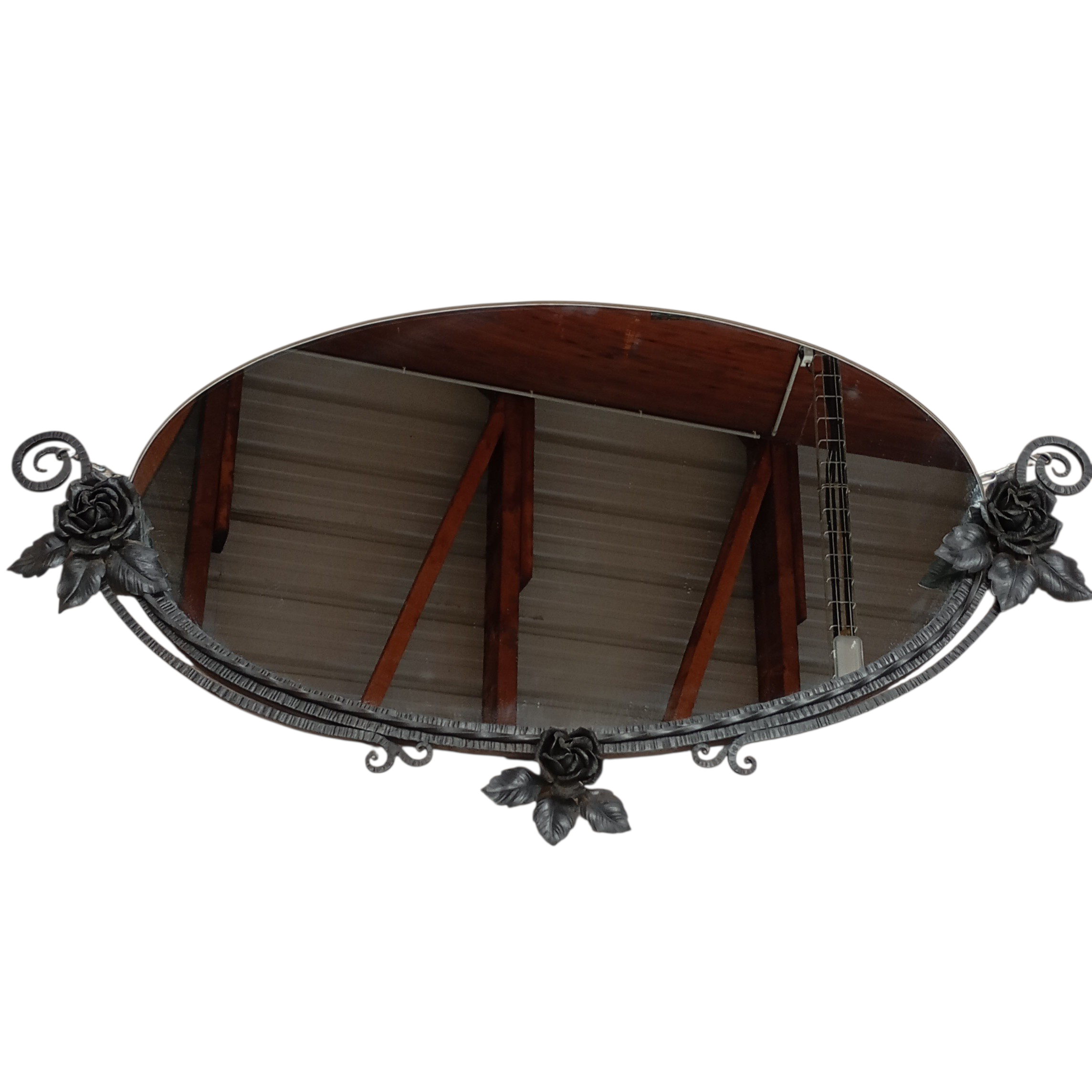 IMPORTANT MIROIR OVALE A DECOR DE FLEURS EN FER FORGE