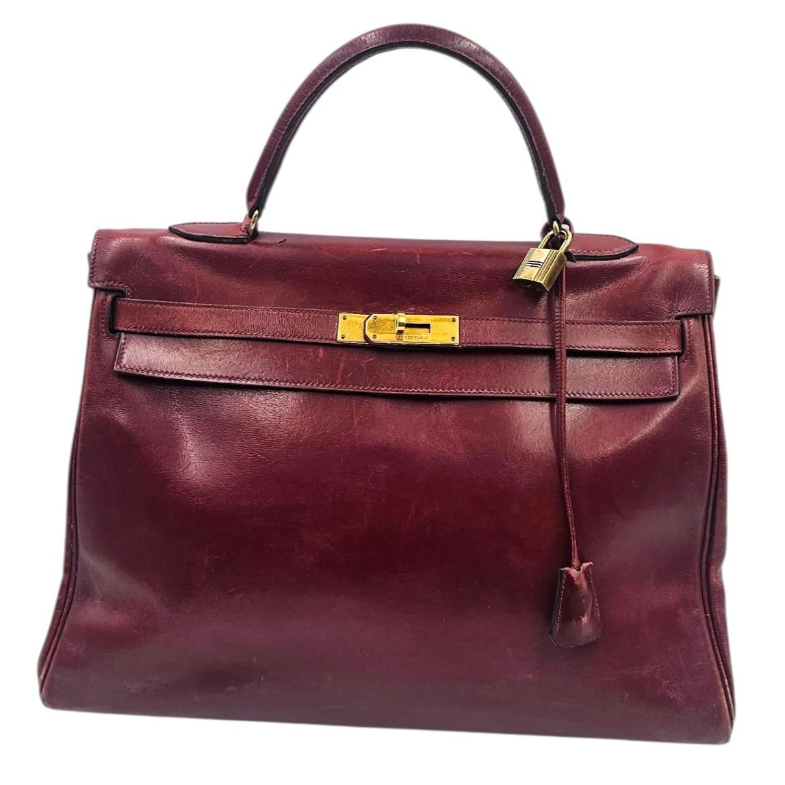 HERMES SAC KELLY 35 CUIR BOX BORDEAUX BIJOUTERIE PLAQUE OR CIRCA 1976 + DUSTBAG