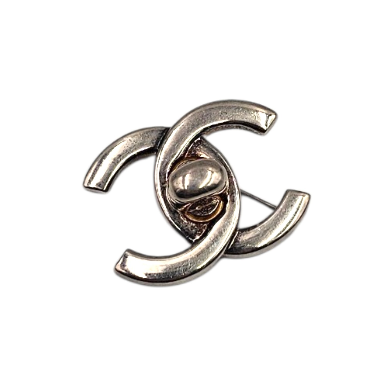 CHANEL BROCHE TURNLOCK EN METAL FINITION PALLADIUM CIRCA AUTOMNE 1996