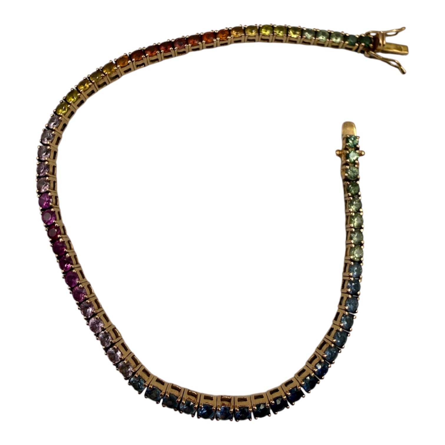 BRACELET TENNIS RAINBOW EN OR (750) SERTI DE SAPHIRS MULTICOLORES PB9.26 GR
