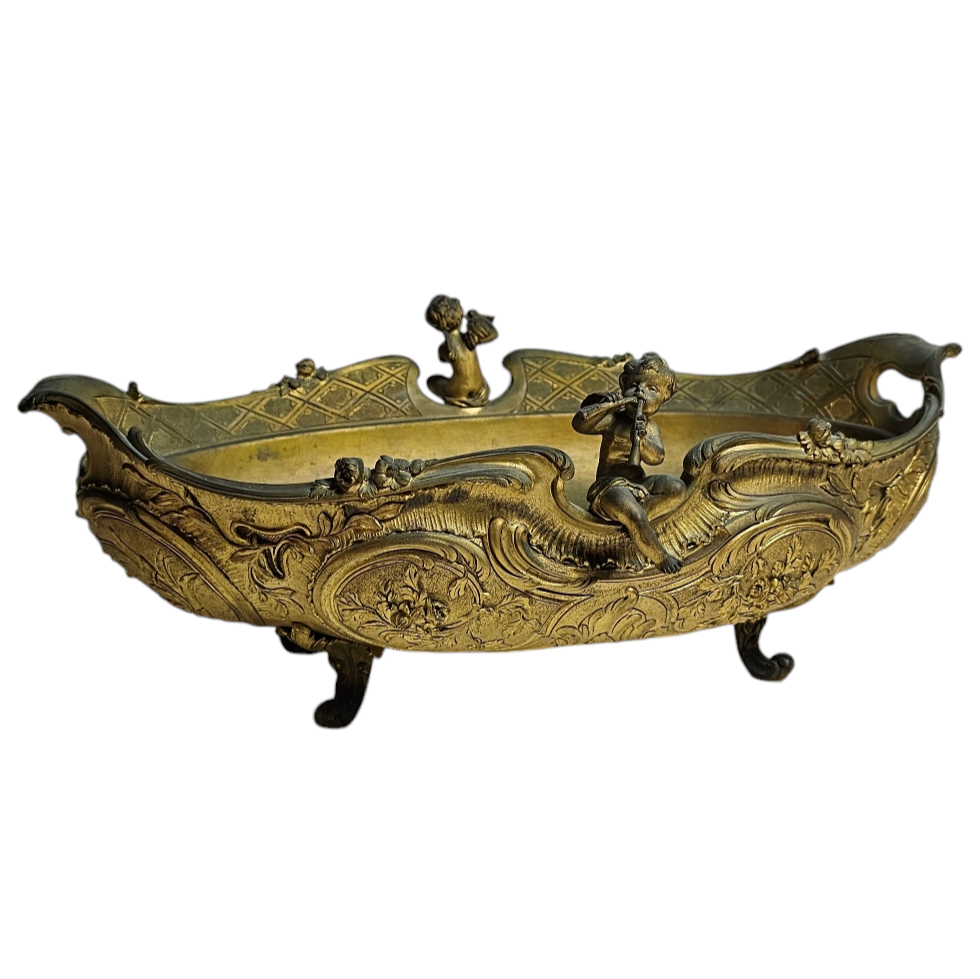 GRANDE JARDINIERE EN BRONZE A DECOR DE CHERUBINS 44 x 26 x 16 CM