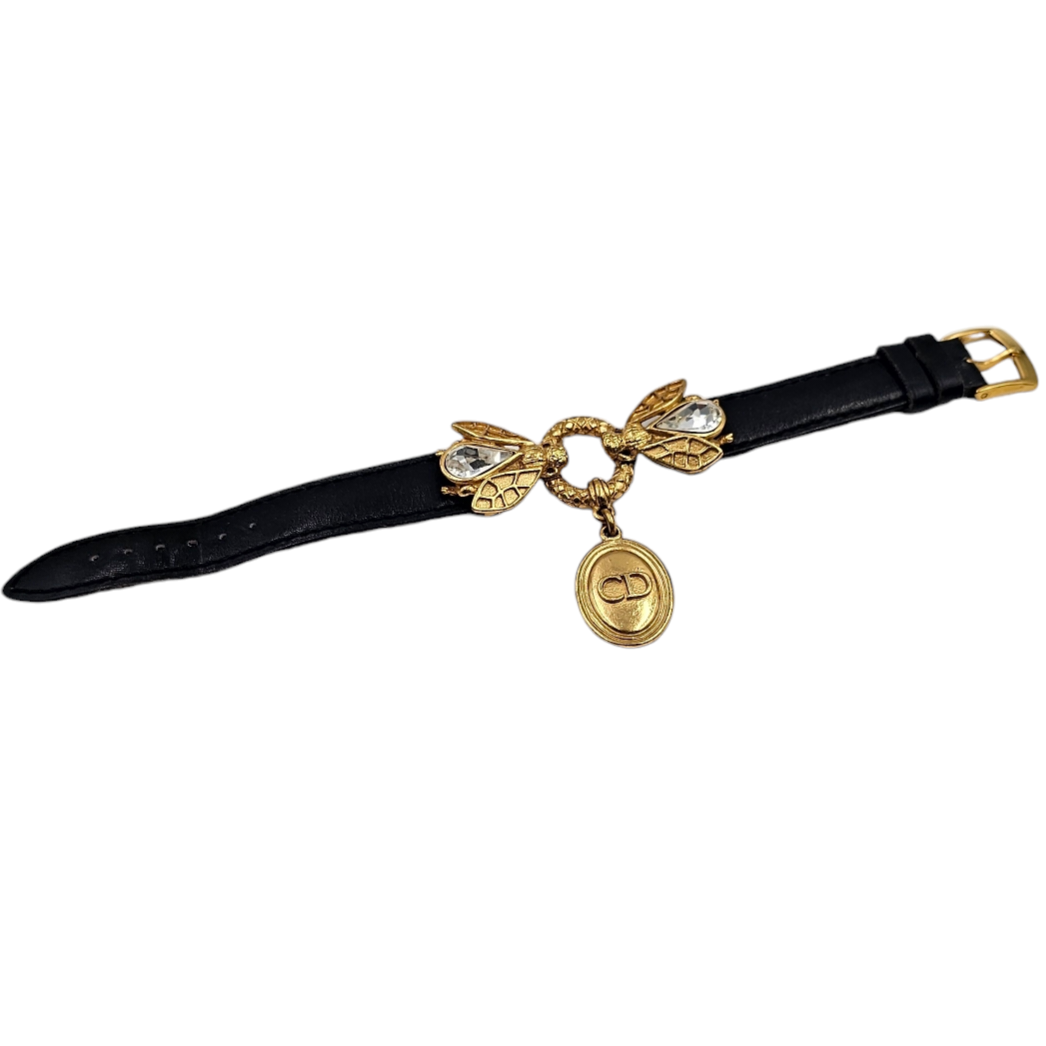 CHRISTIAN DIOR BRACELET A DECOR D ABEILLES DOREES, CRISTAUX SUR CUIR NOIR