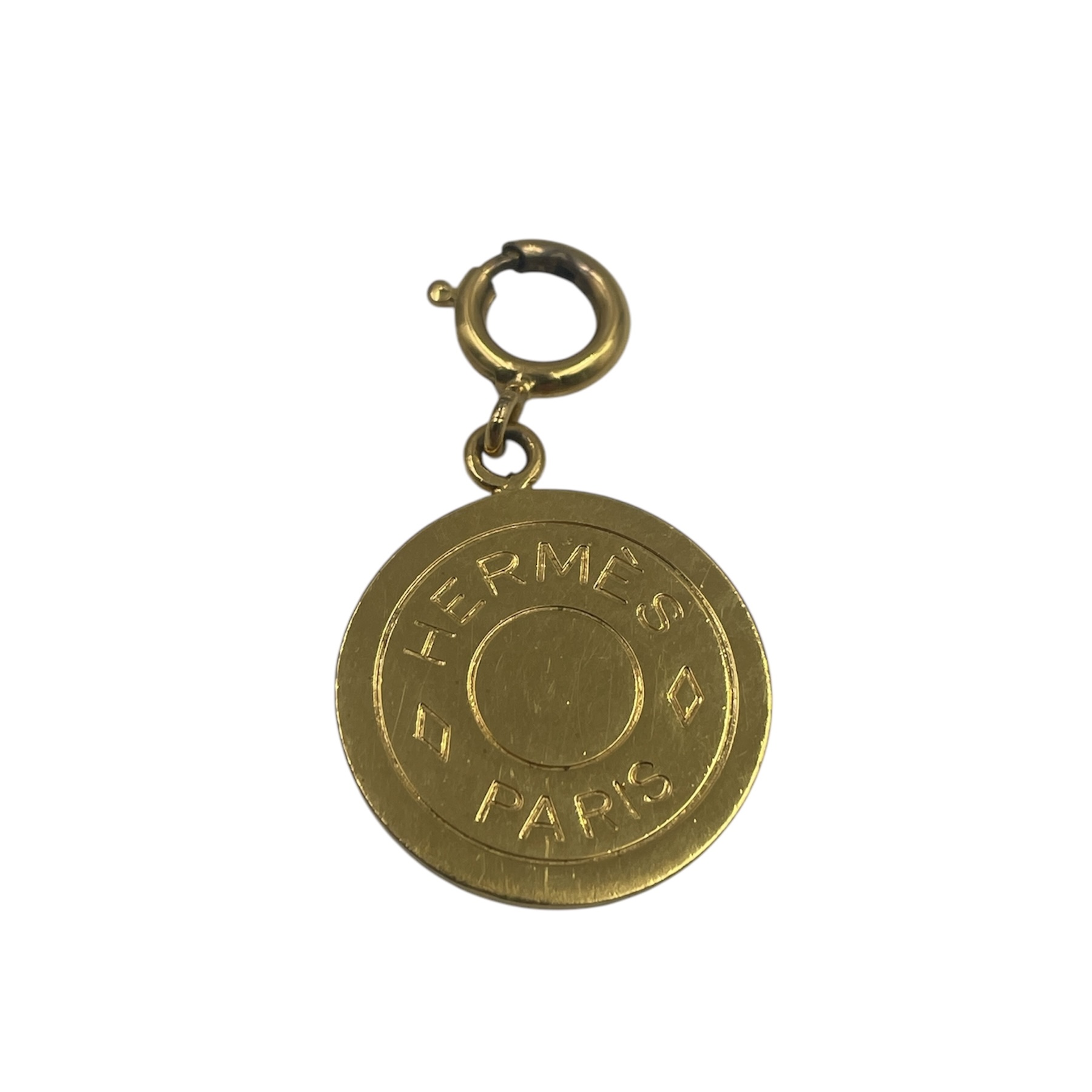 HERMES CLOU SELLIER CHARMS OU PENDENTIF EN METAL DORE